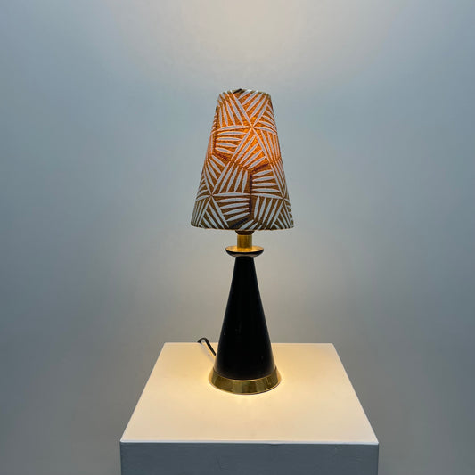 Italian mid-century table lamp
1960s brass and wood lamp
vintage conical table light
black lacquered wooden lamp
Italian design lighting
mid-century modern table lamp
rewired vintage Italian lamp
custom lampshade table light
brass detail table lamp
designer lighting from Italy
