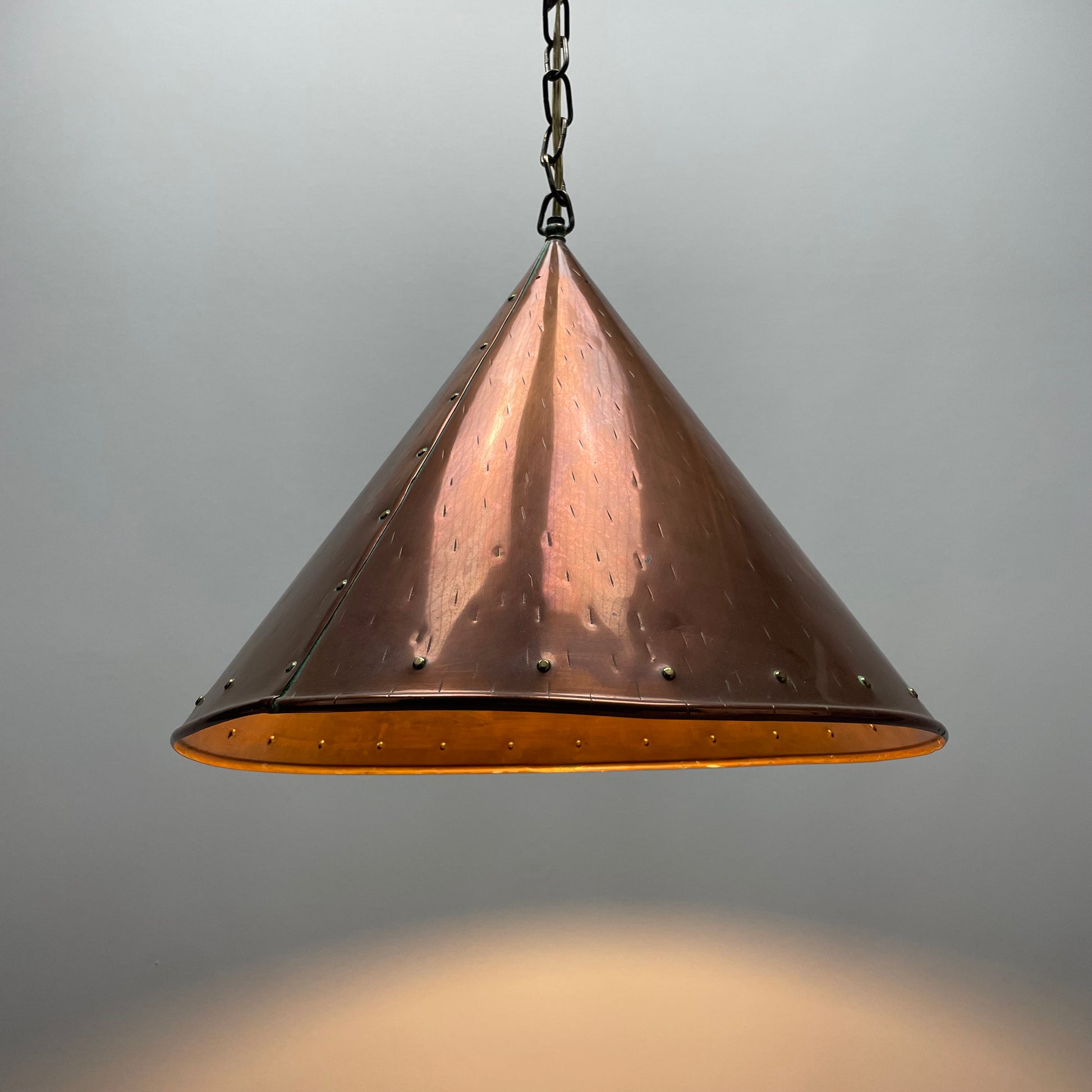 Vintage Danish lighting
Copper pendant lamp
Scandinavian home décor
Mid-century modern lighting
1950s designer light
Handcrafted pendant lamp
Unique hammered copper lamp
E.S. Horn Aalestrup light
Iconic Danish craftsmanship
Conical design pendant
