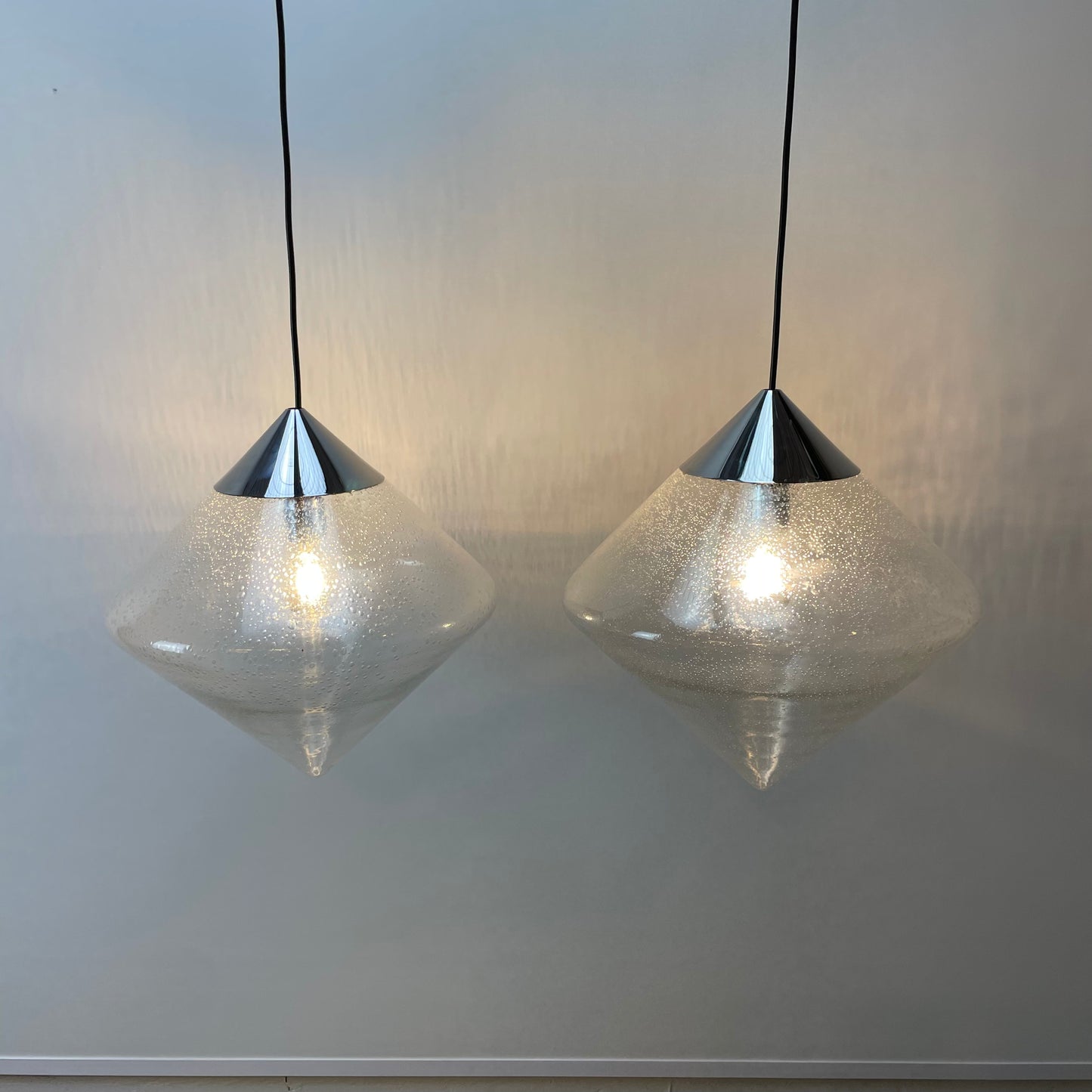 Pair of glass diamond shaped pendant lights B1216.0000 by RAAK , 1970