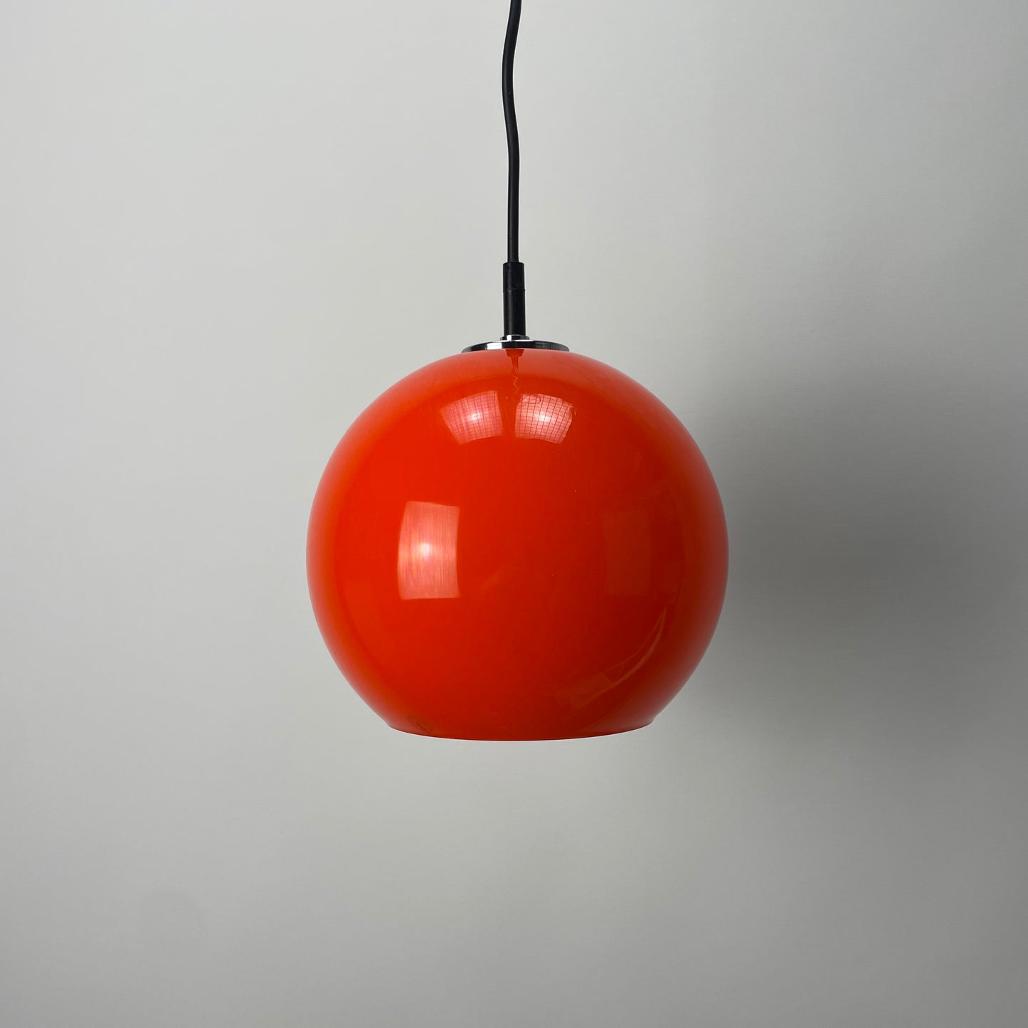 Orange glass globe pendant light by Peill and Putzler 1960