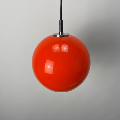 Orange glass globe pendant light by Peill and Putzler 1960