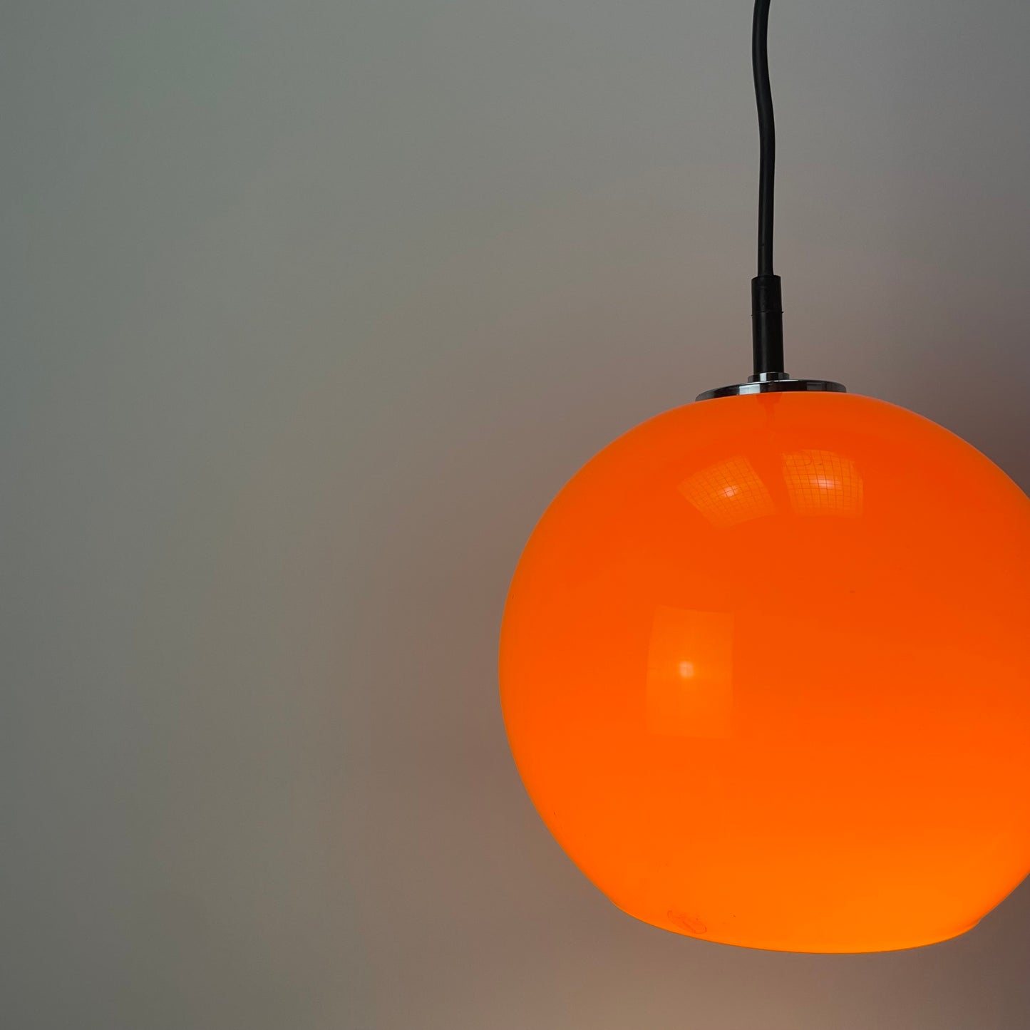 Orange glass globe pendant light by Peill and Putzler 1960