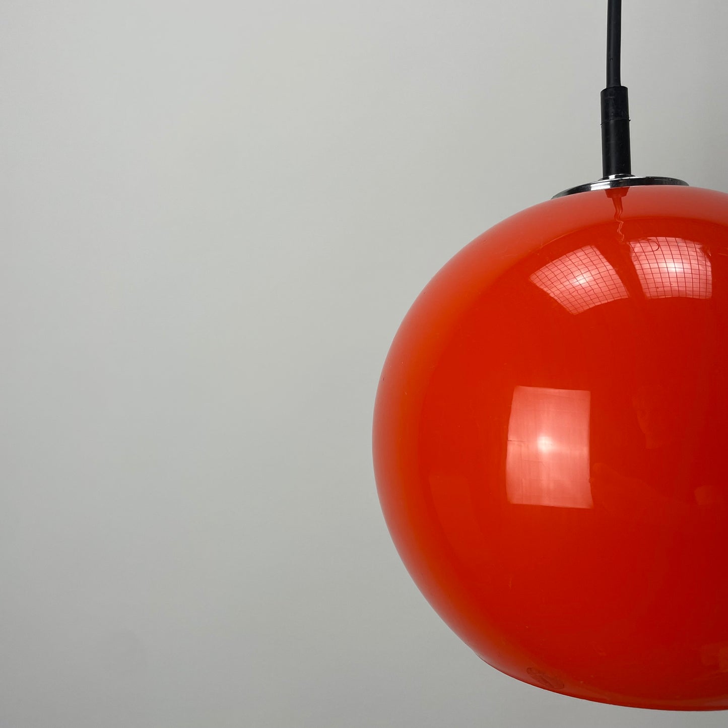 Orange glass globe pendant light by Peill and Putzler 1960