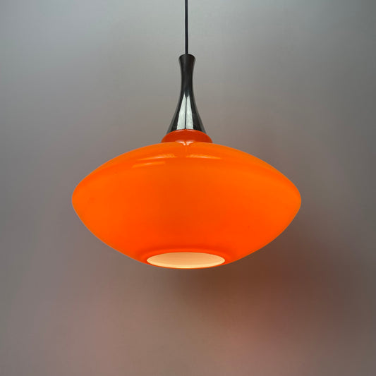 Orange glass UFO pendant light
1970s Space Age design
Vintage German lighting
Aluminum detail lamp
Retro ceiling light
Unique pendant lamp
Warm ambient lighting
Rewired pendant light
Mid-century modern decor
Collectible vintage lamp