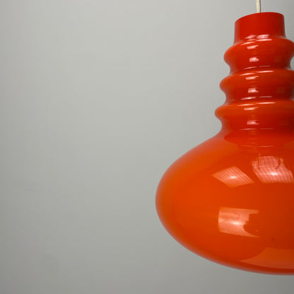 Orange midcentury glass pendant light by Peill & Putzler 1960