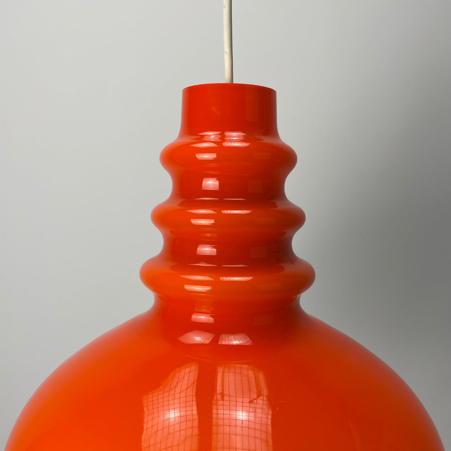 Orange midcentury glass pendant light by Peill & Putzler 1960