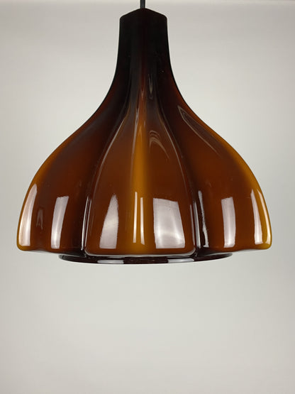 Flower shaped brown / caramel glass pendant light by Peill and Putzler 1960