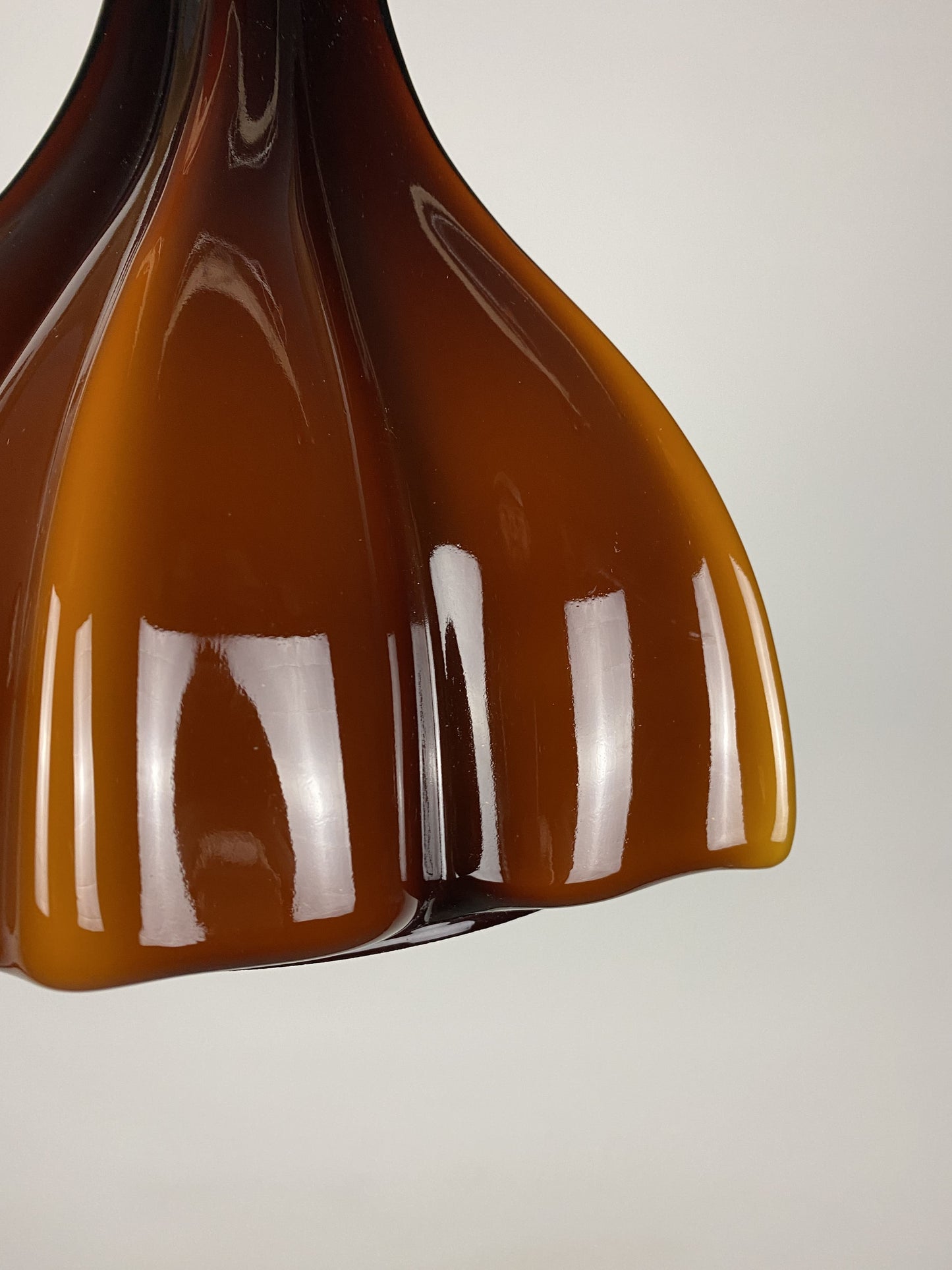 Flower shaped brown / caramel glass pendant light by Peill and Putzler 1960