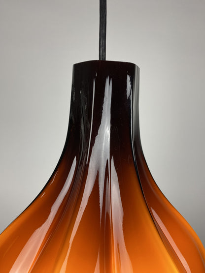 Flower shaped brown / caramel glass pendant light by Peill and Putzler 1960