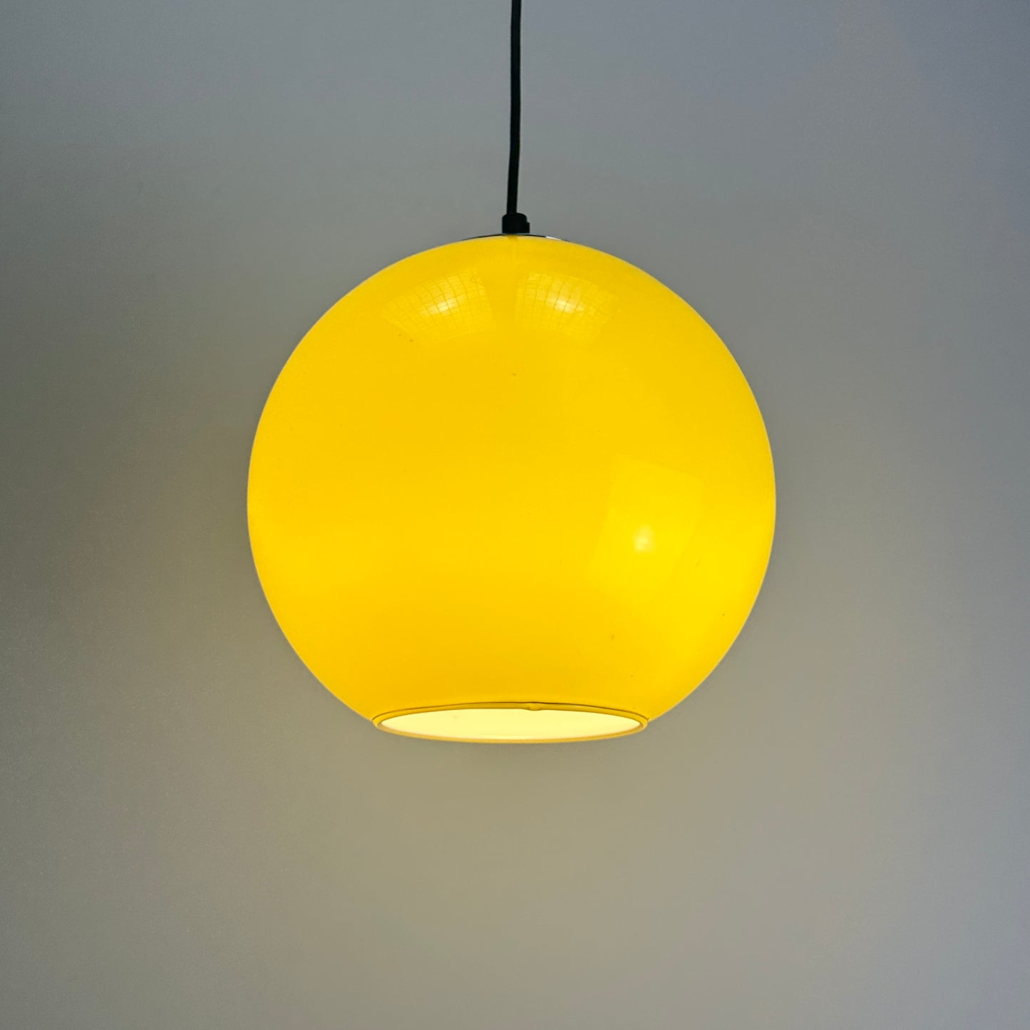 Neon yellow globe glass pendant light by Peill & putzler 1970