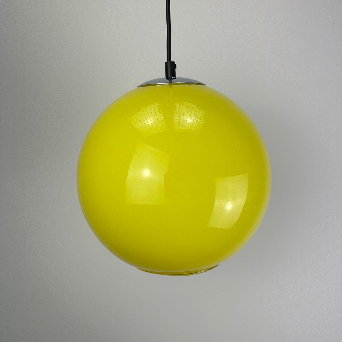 Neon yellow globe glass pendant light by Peill & putzler 1970