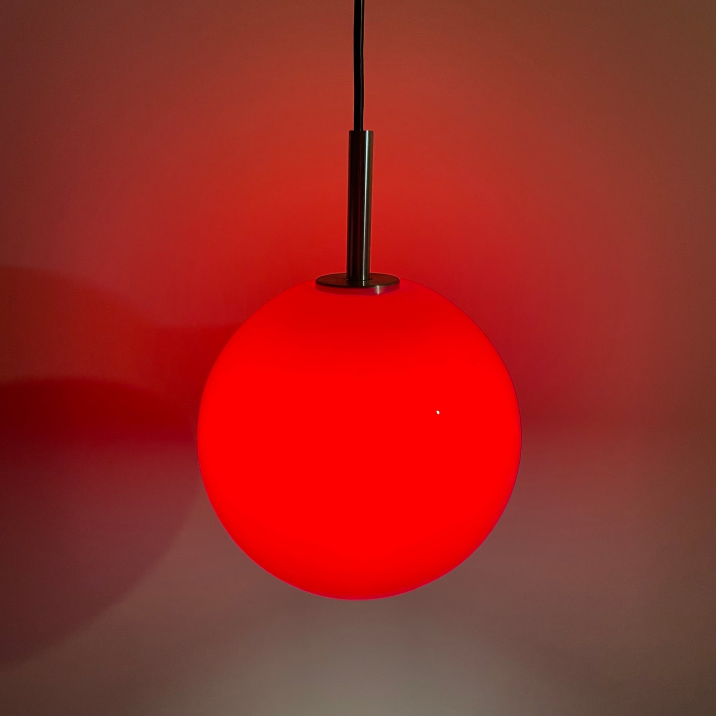 Red opaline glass globe pendant light from Peill & Putzler 1960