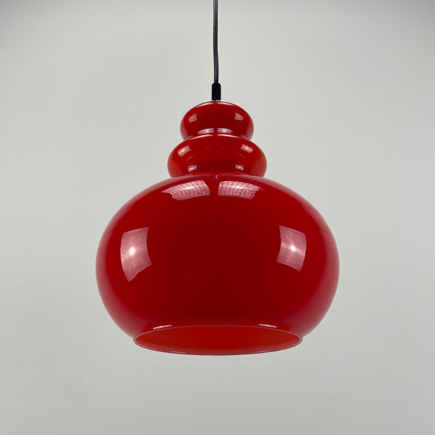 Red glass pendant light by Peill and Putzler 1960