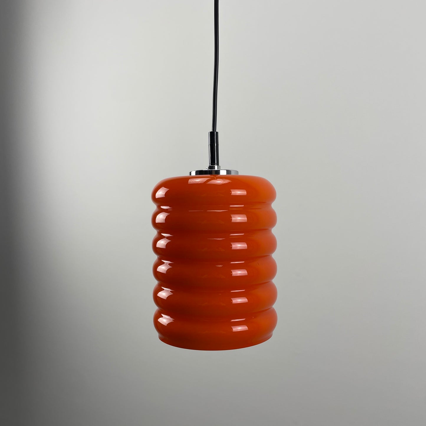 Ribbed orange glass pendant light from 1960