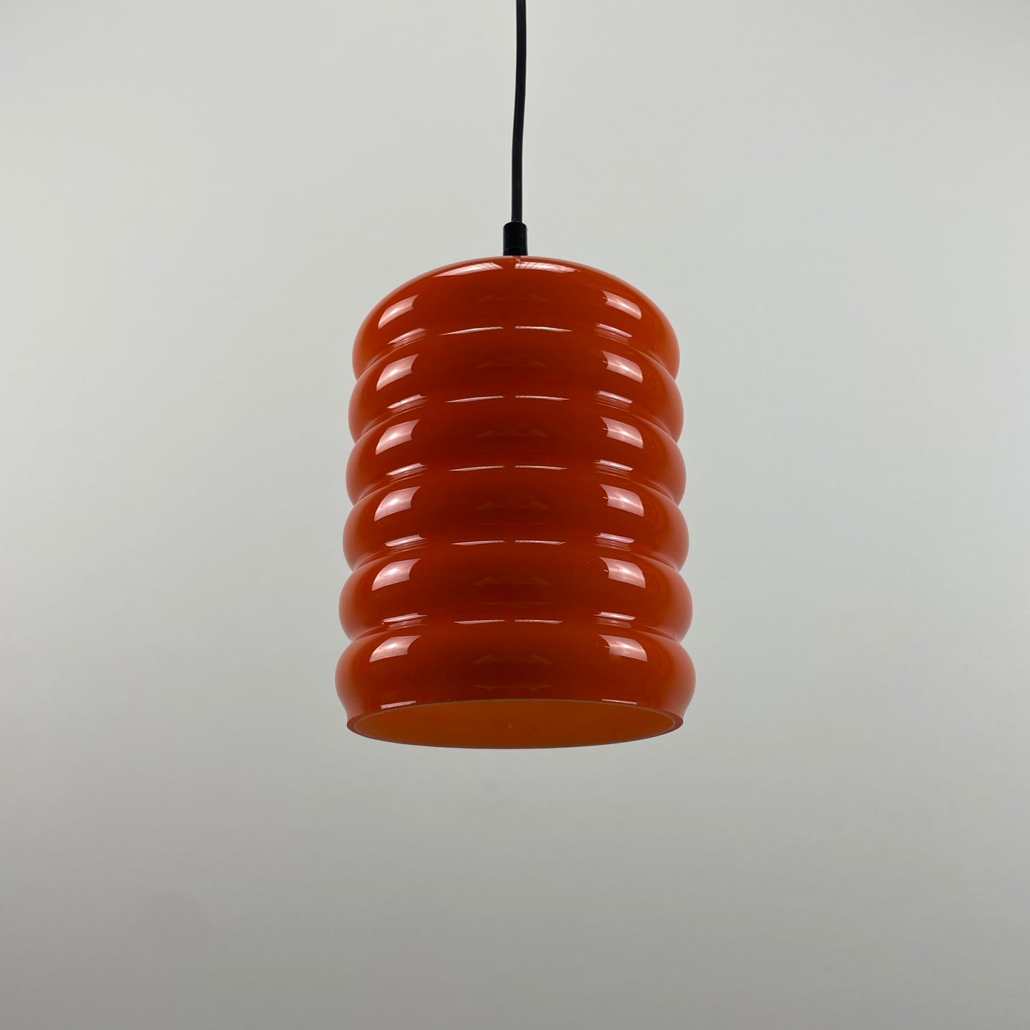 Ribbed orange glass pendant light from 1960