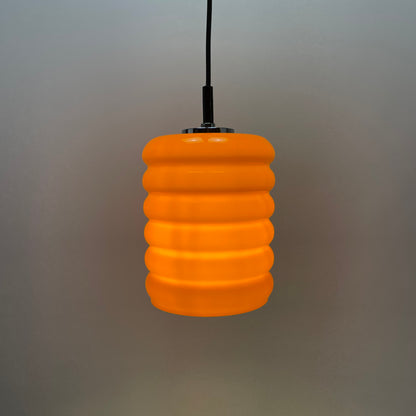 Ribbed orange glass pendant light from 1960