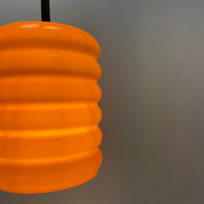 Ribbed orange glass pendant light from 1960