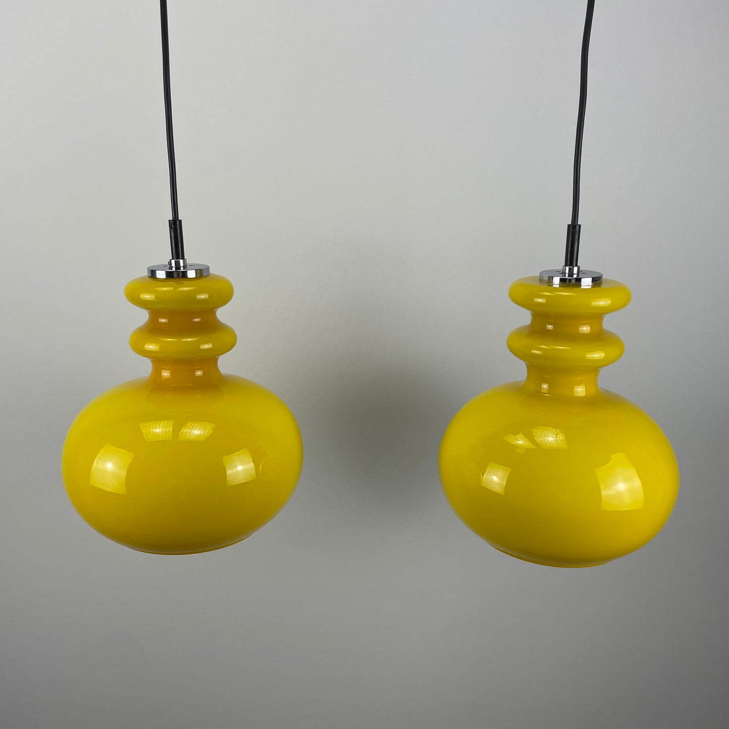 Pair of yellow glass Peill & Putzler pendant lights 1960