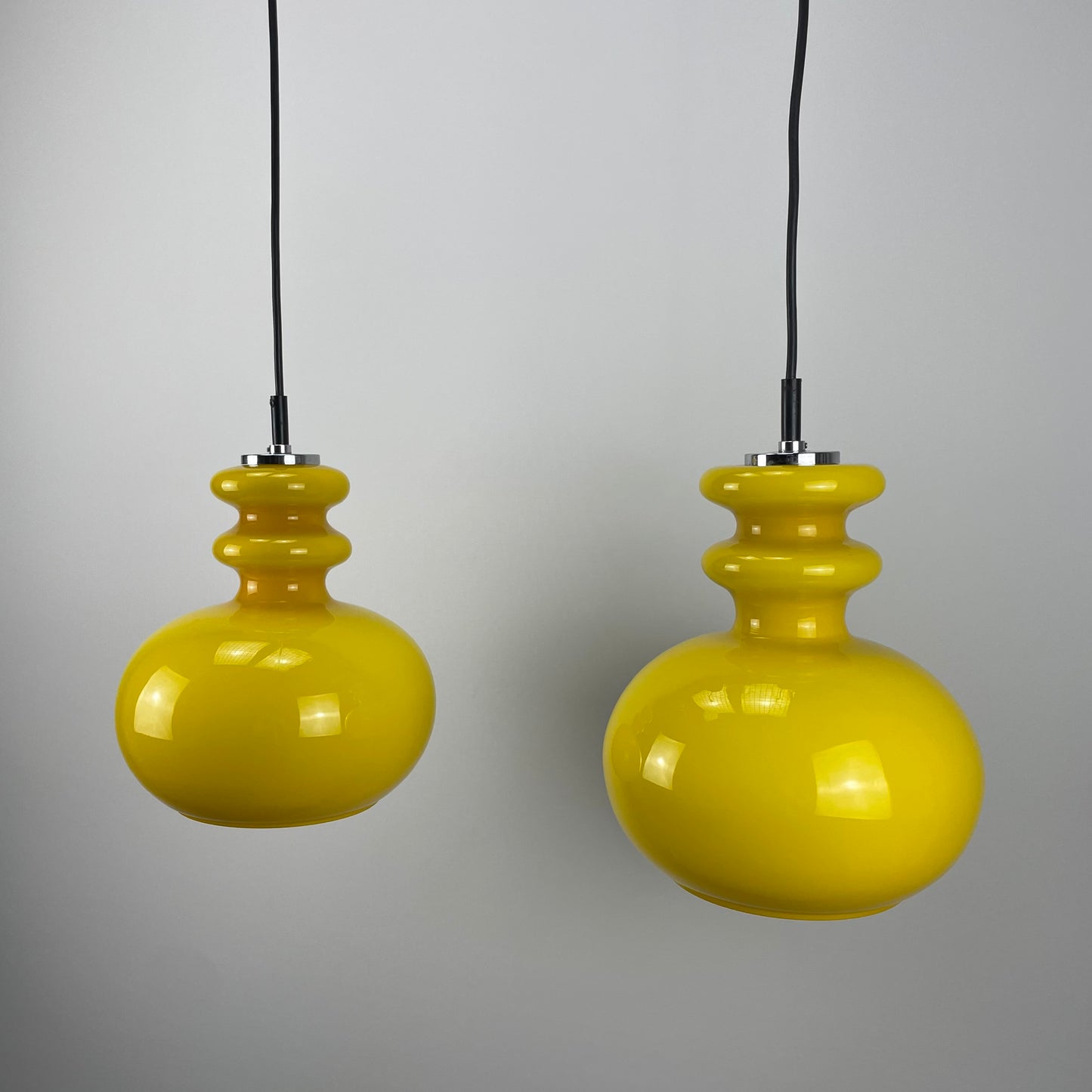 Pair of yellow glass Peill & Putzler pendant lights 1960