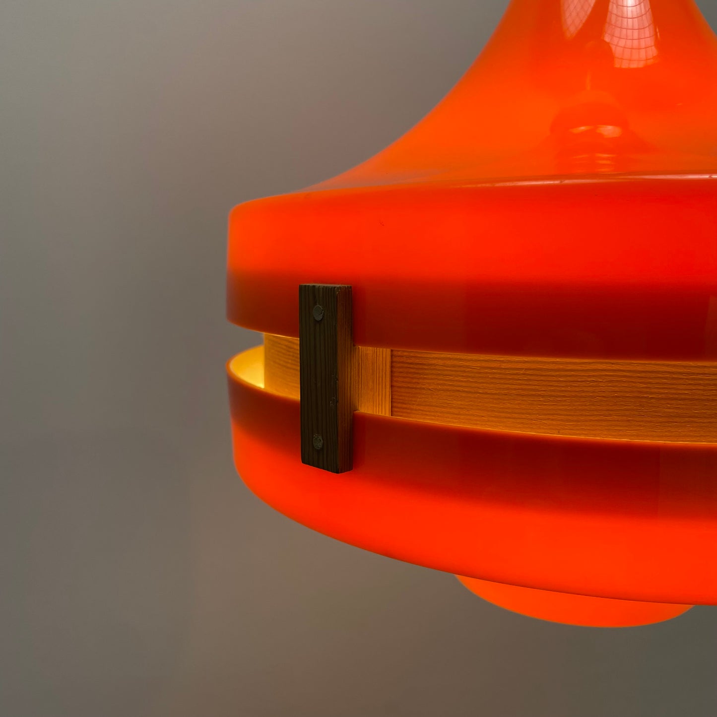 Scandinavian UFO shaped orange plexiglass pendant light 1970