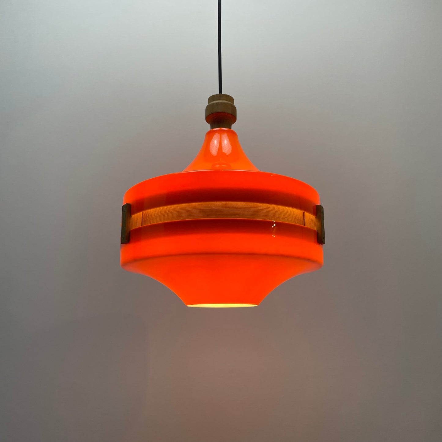 Scandinavian UFO shaped orange plexiglass pendant light 1970