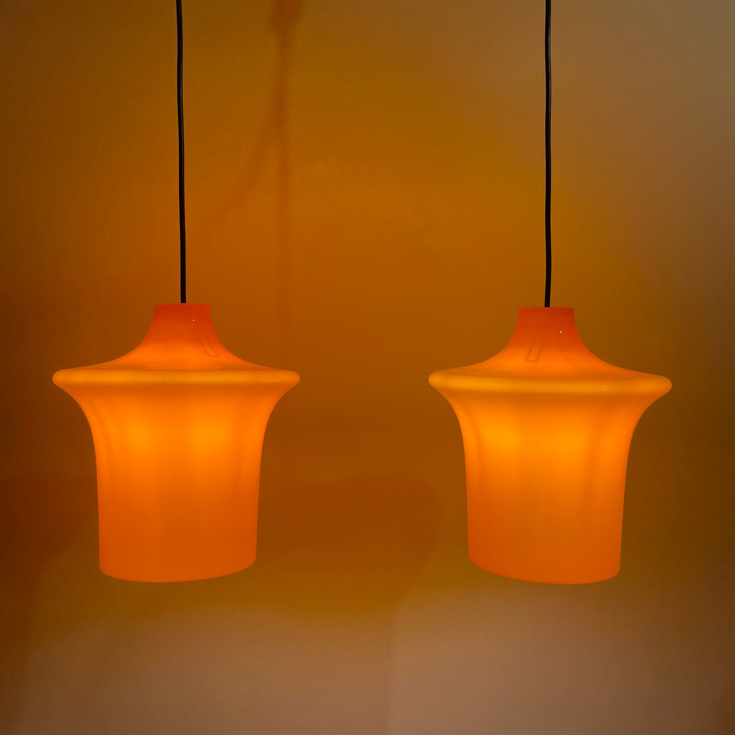 Pair of orange glass B-1204 pendant lights by Raak Amsterdam 1970