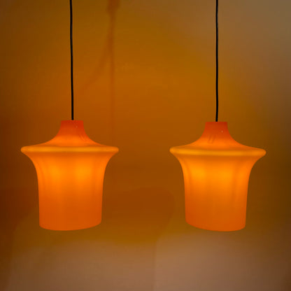 Pair of orange glass B-1204 pendant lights by Raak Amsterdam 1970