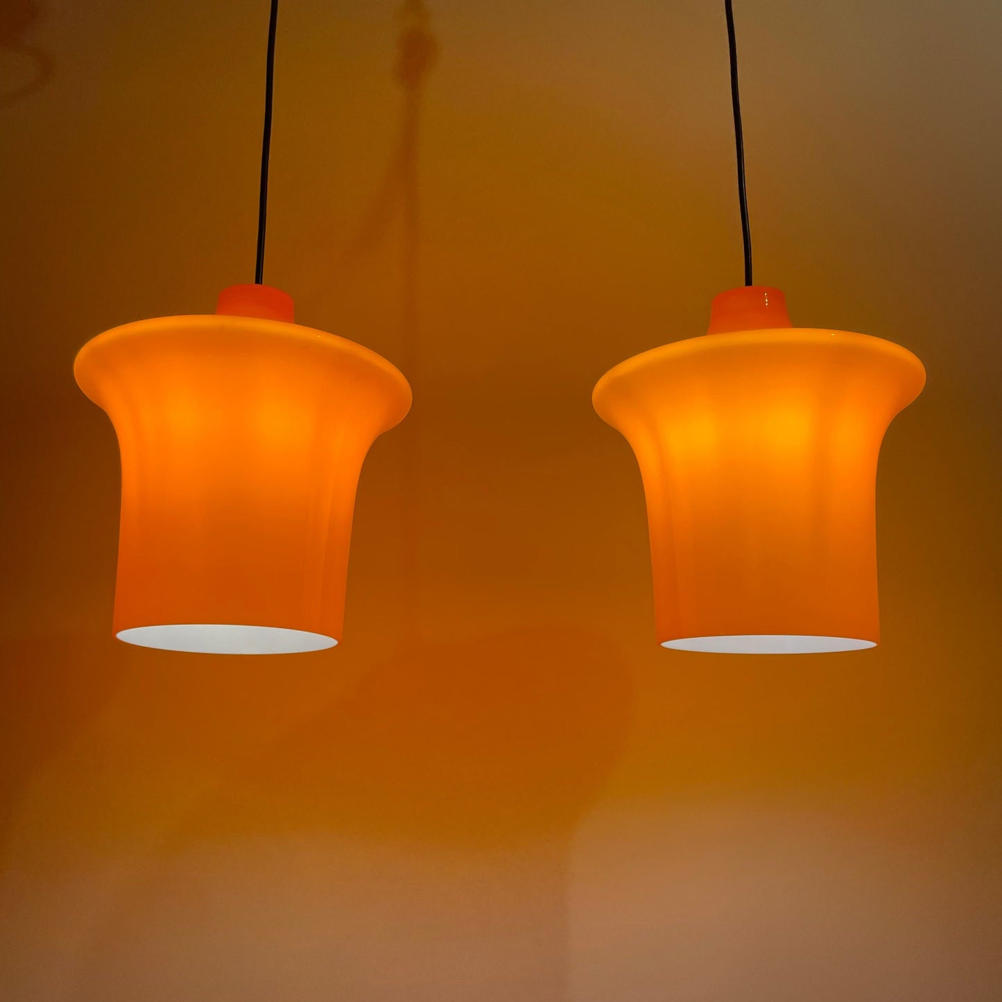 Pair of orange glass B-1204 pendant lights by Raak Amsterdam 1970