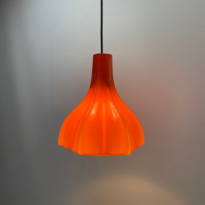 Flower shaped orange glass pendant light by Peill and Putzler 1960