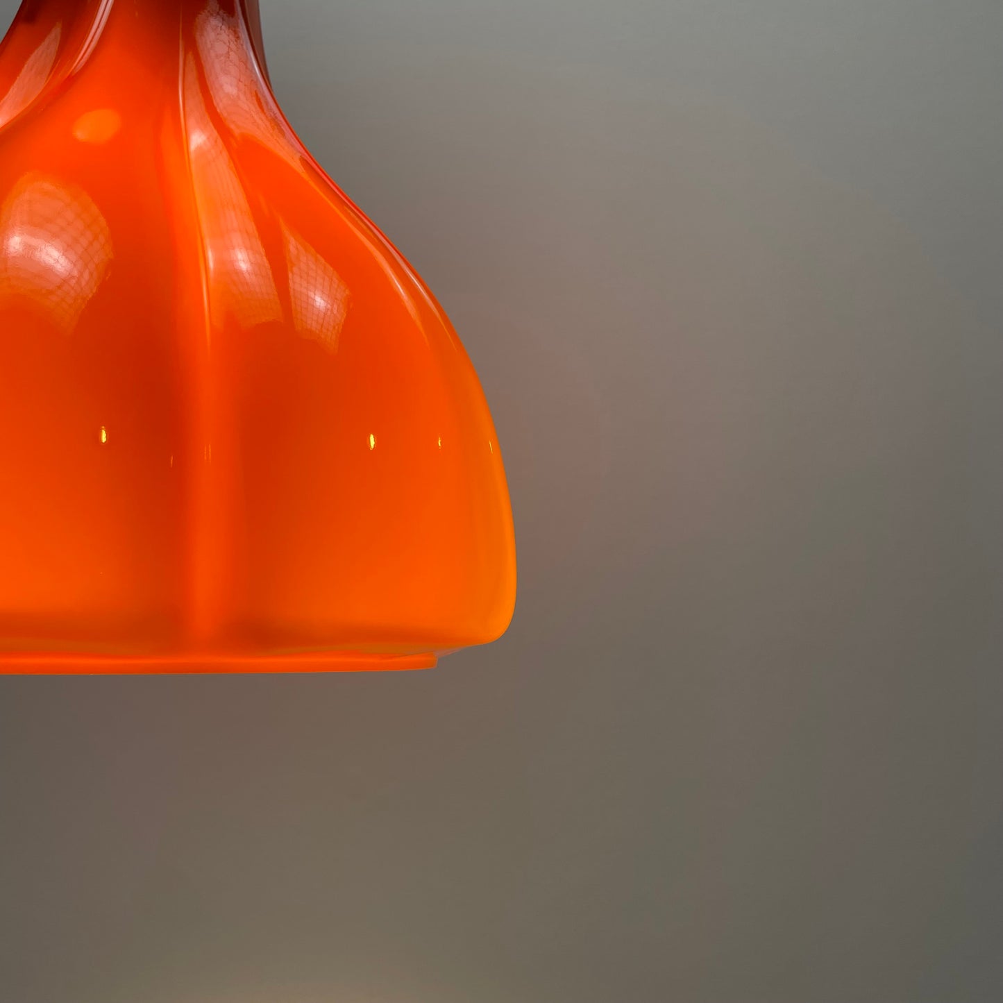 Flower shaped orange glass pendant light by Peill and Putzler 1960