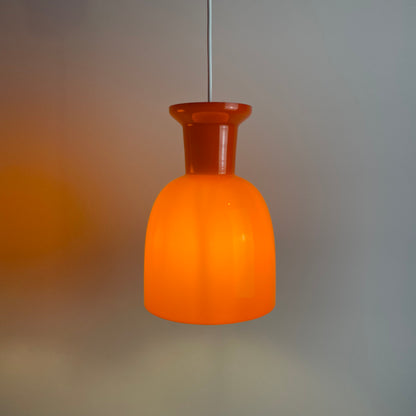 Pair of orange glass B-1203 pendant lights by Raak Amsterdam, 1970