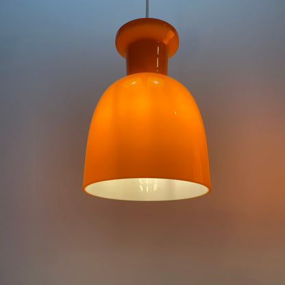 Pair of orange glass B-1203 pendant lights by Raak Amsterdam, 1970