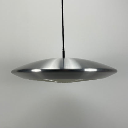 silver pendant lamp
Jo Hammerborg design
Fog & Mørup lighting
UFO shape lamp
Mid-century modern pendant
Vintage diskos lamp
Stylish hanging light
Original design piece
Decorative lighting solution
Unique home decor