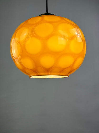 Caramel glass globe shaped pendant light from Germany, 1960