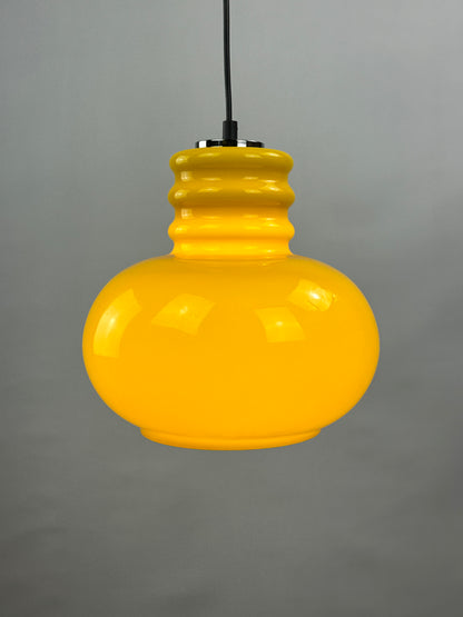 Yellow glass pendant light by Peill and Putzler 1960