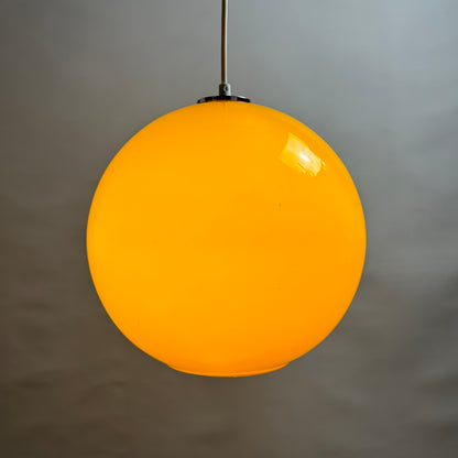 Yellow glass globe pendant light XL by Peill and Putzler 1960
