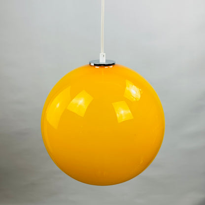 Yellow glass globe pendant light XL by Peill and Putzler 1960