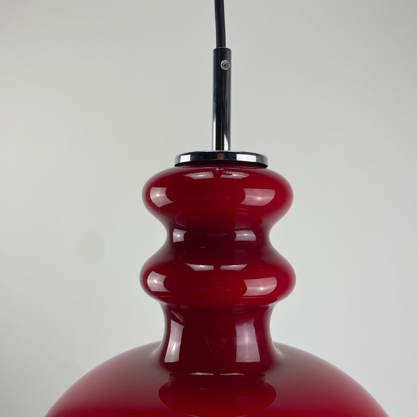 Red glass pendant light by Peill and Putzler, 1960
