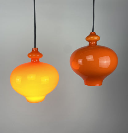 1 of 2 Swedish orange glass pendant light Oplight by Hans Agne Jakobsson for AB Markaryd