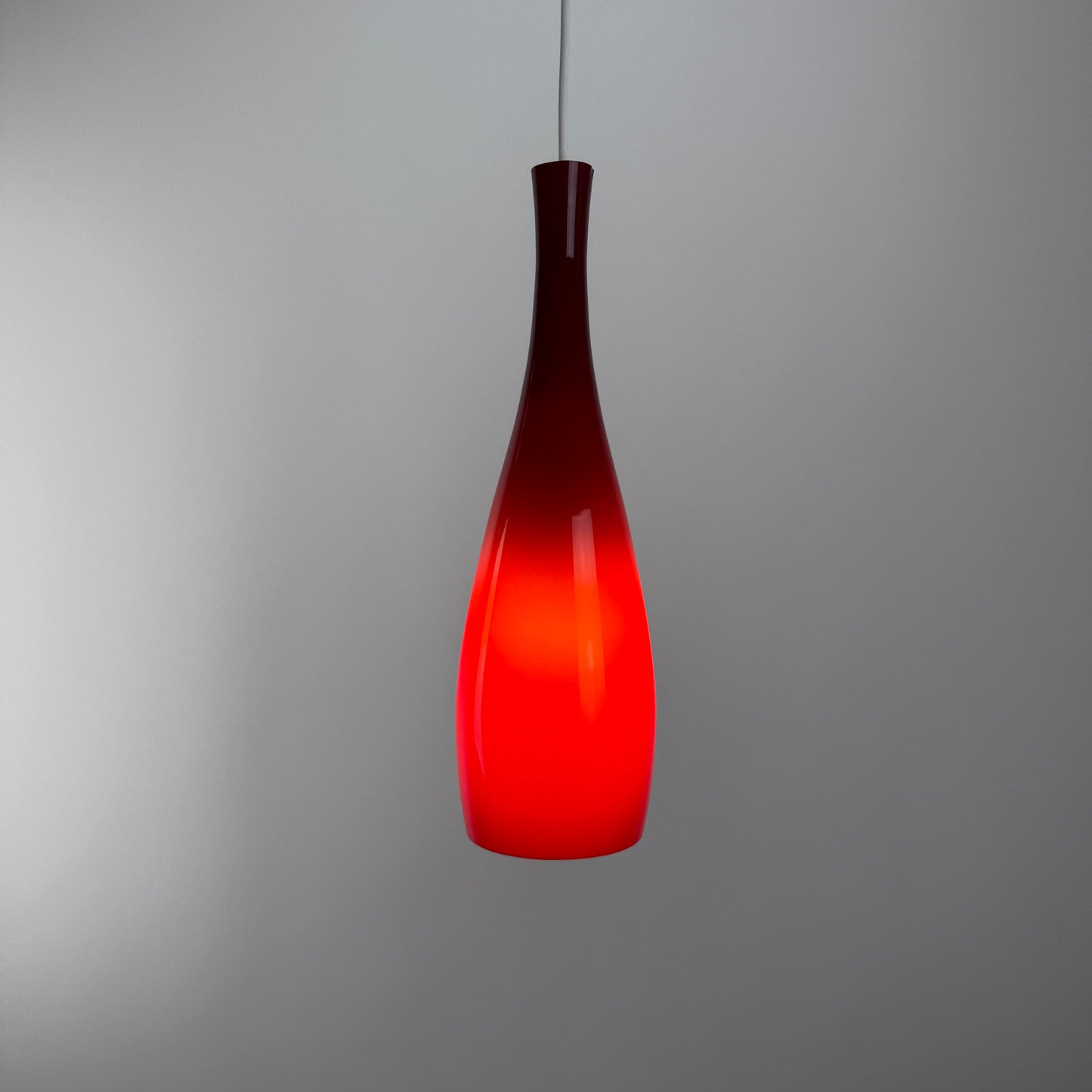 Red glass pendant lamp by Jacob Bang for Fog & Mørup 1960