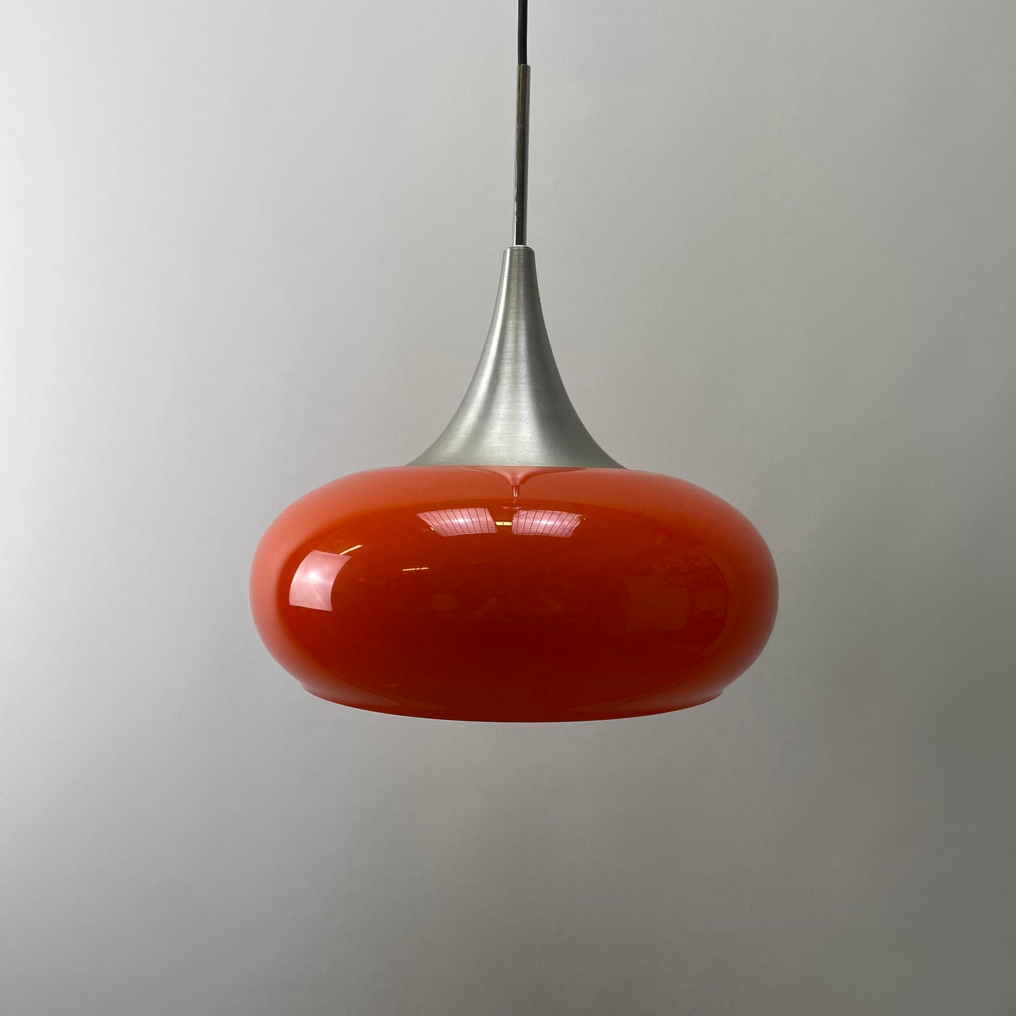 Orange UFO shaped glass pendant light by Doria Leuchten 1970