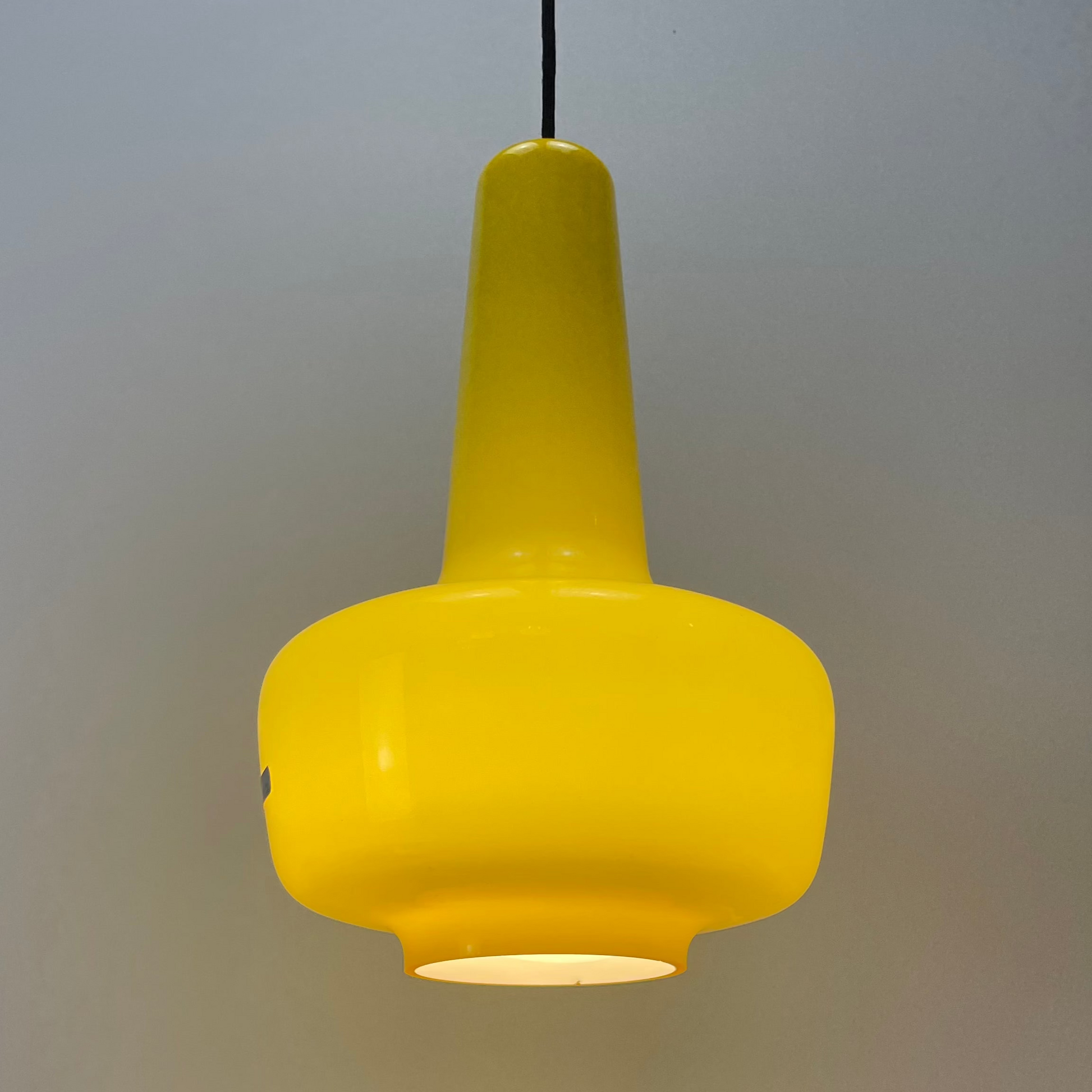 Jacob Bang Kreta lamp, Holmegaard pendant light, neon yellow glass lamp, 1960s Danish design, vintage opaline lighting, rare pendant light, Scandinavian design classic, decorative ceiling lamp, mid-century modern fixture, colorful glass pendant.