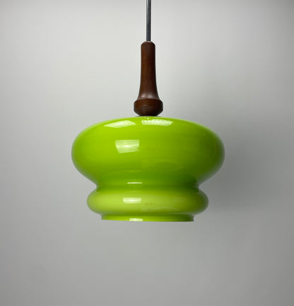 Vintage lamp, opaline glass pendant, green glass lamp, wooden accent lighting, 1960s design, mid-century modern, German pendant lamp, retro lighting, apple-green lamp, soft glow pendant.