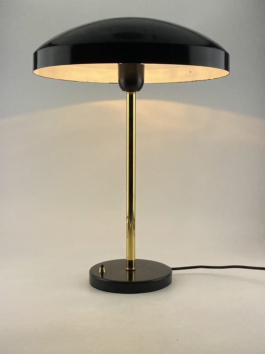 Rare black and gold table lamp UFO by Louis Kalff for Philips