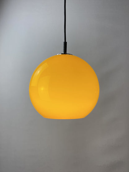 Yellow glass globe pendant light by Peill and Putzler 1960