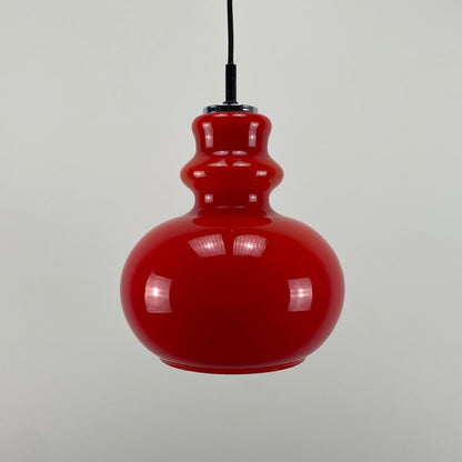 Red glass pendant light by Peill and Putzler 1960