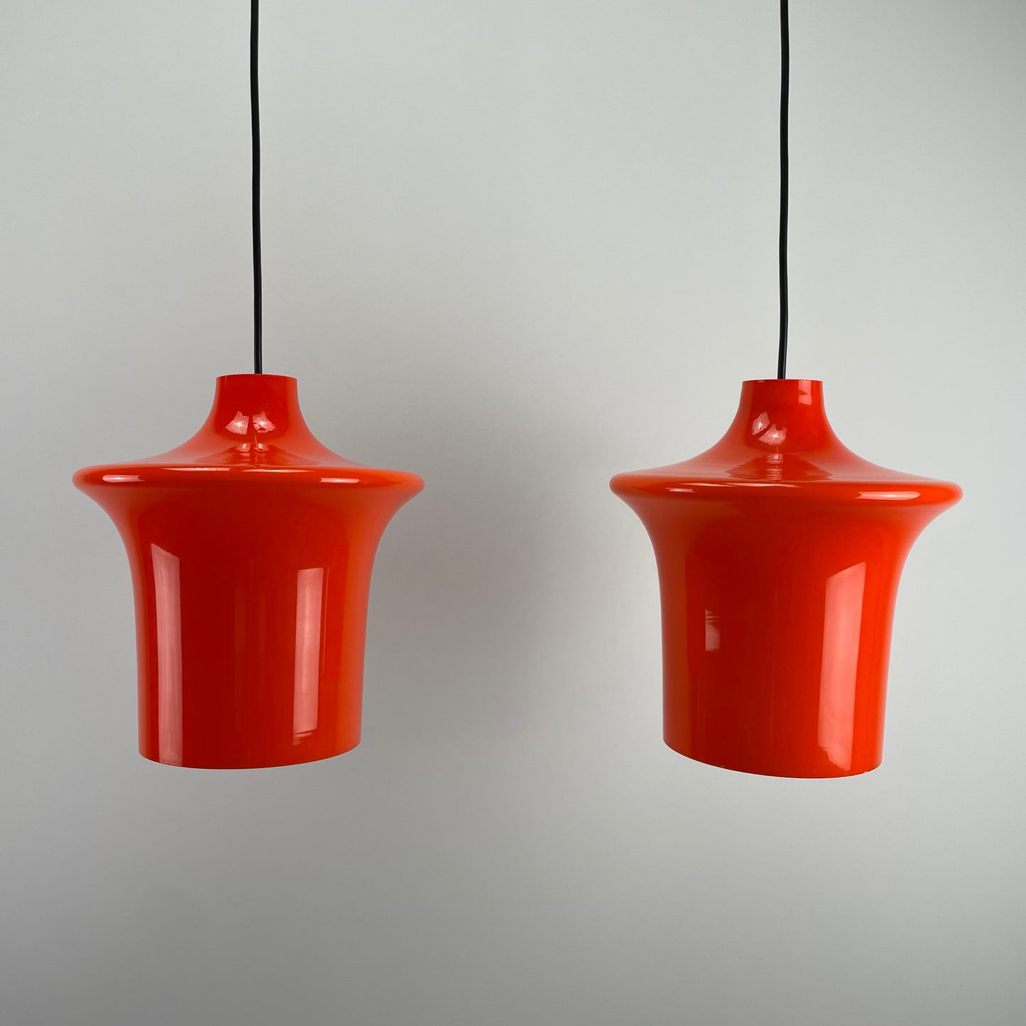 Pair of orange glass B-1204 pendant lights by Raak Amsterdam 1970